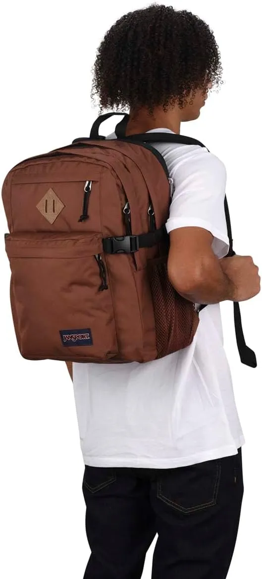 JanSport Main Campus Backpack - Travel or Work backpack w 15-Inch Laptop Sleeve and Dual Water Bottle Pockets, Basic Brown
